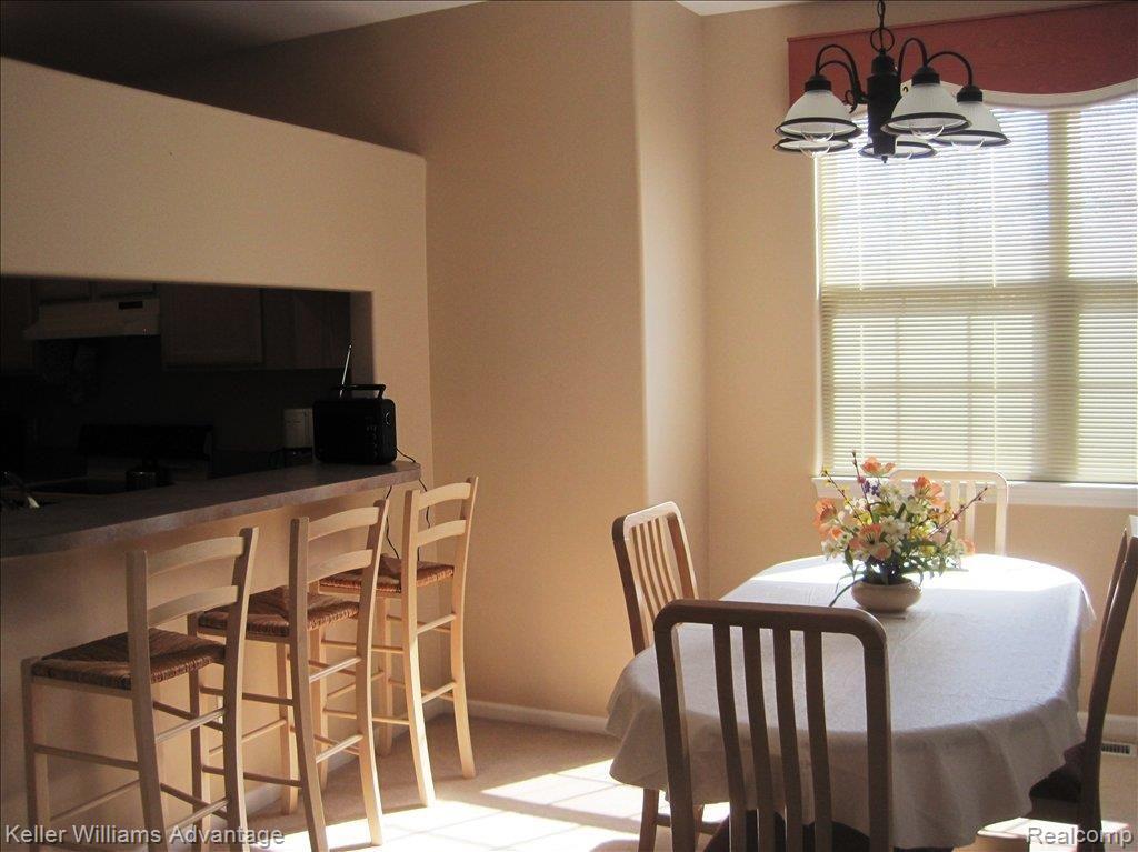 28806 Five Mile Road, Unit 1 Livonia, MI 48154 - Photo 9 of 13 Breakfast Bar and Dining Room
