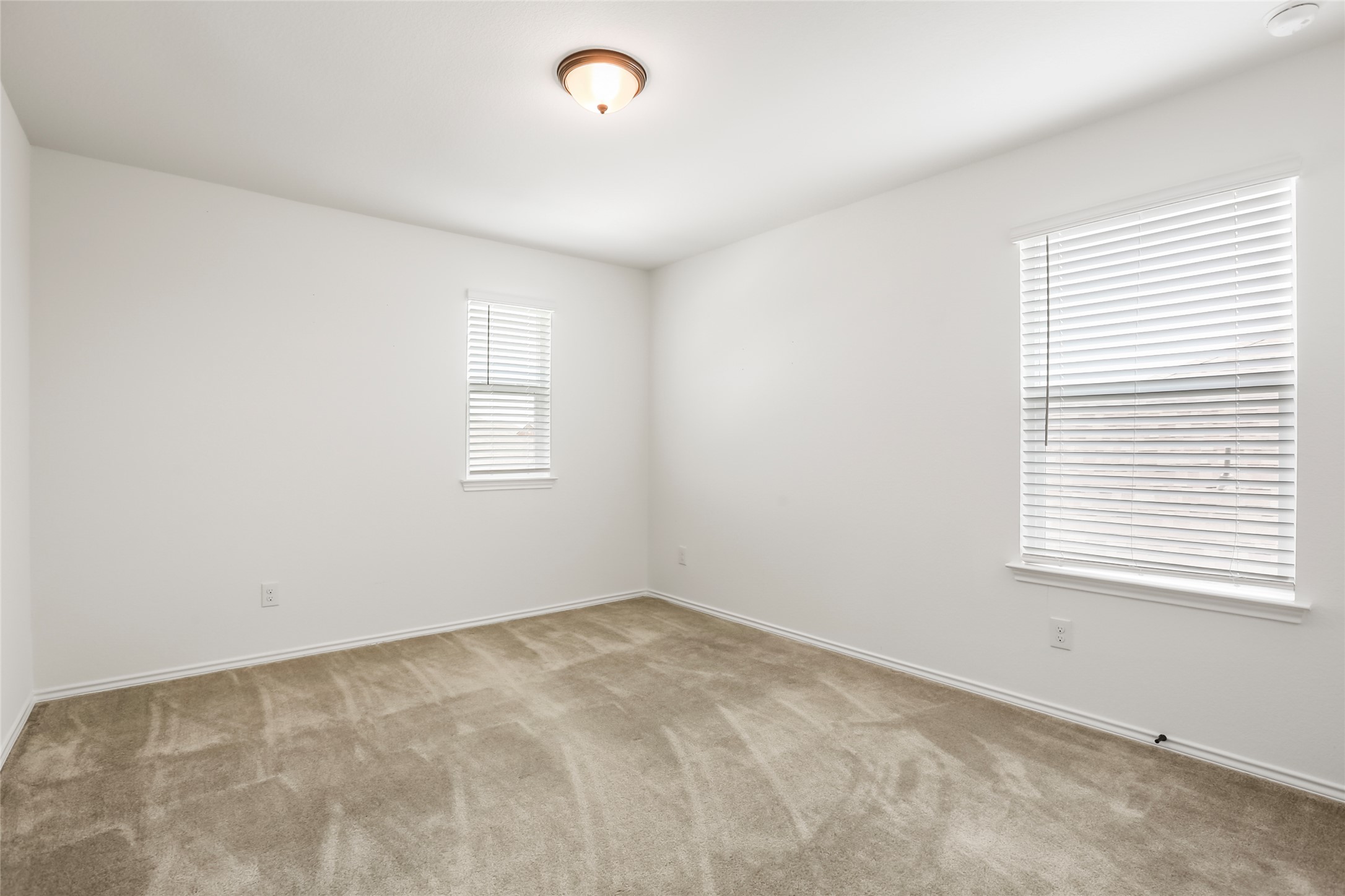18917 Rushmore Street Manor, TX 78653 - Photo 21 of 28 an empty room with a window