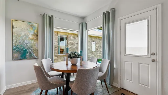 a kitchen with a sink stove top oven and microwave