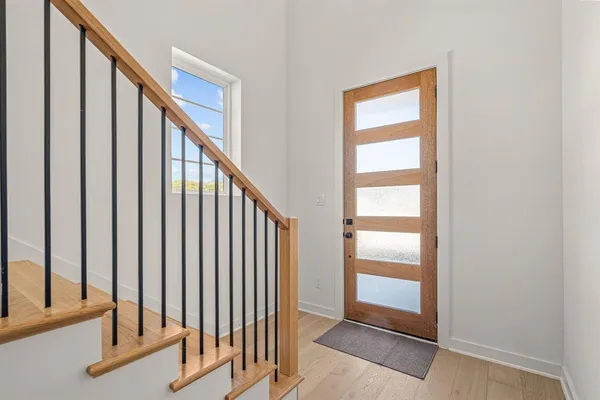 a view of an entryway with staircase