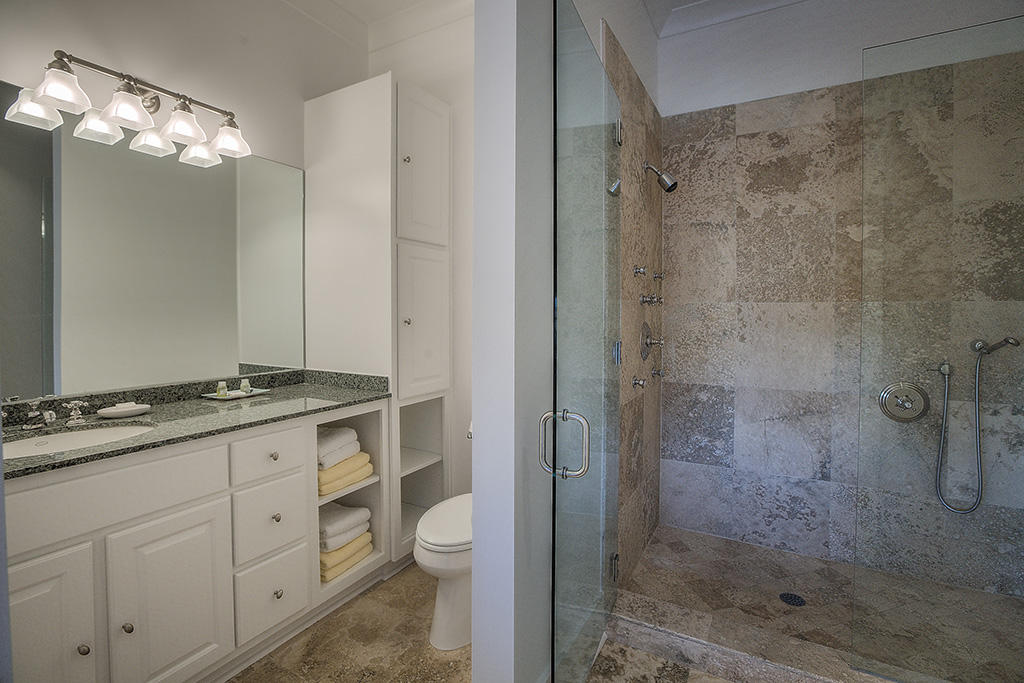 11 Atticus Road Rosemary Beach, FL 32461 - Photo 17 of 28 a spacious bathroom with a granite countertop sink toilet and shower