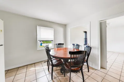 a view of a dining room with furniture
