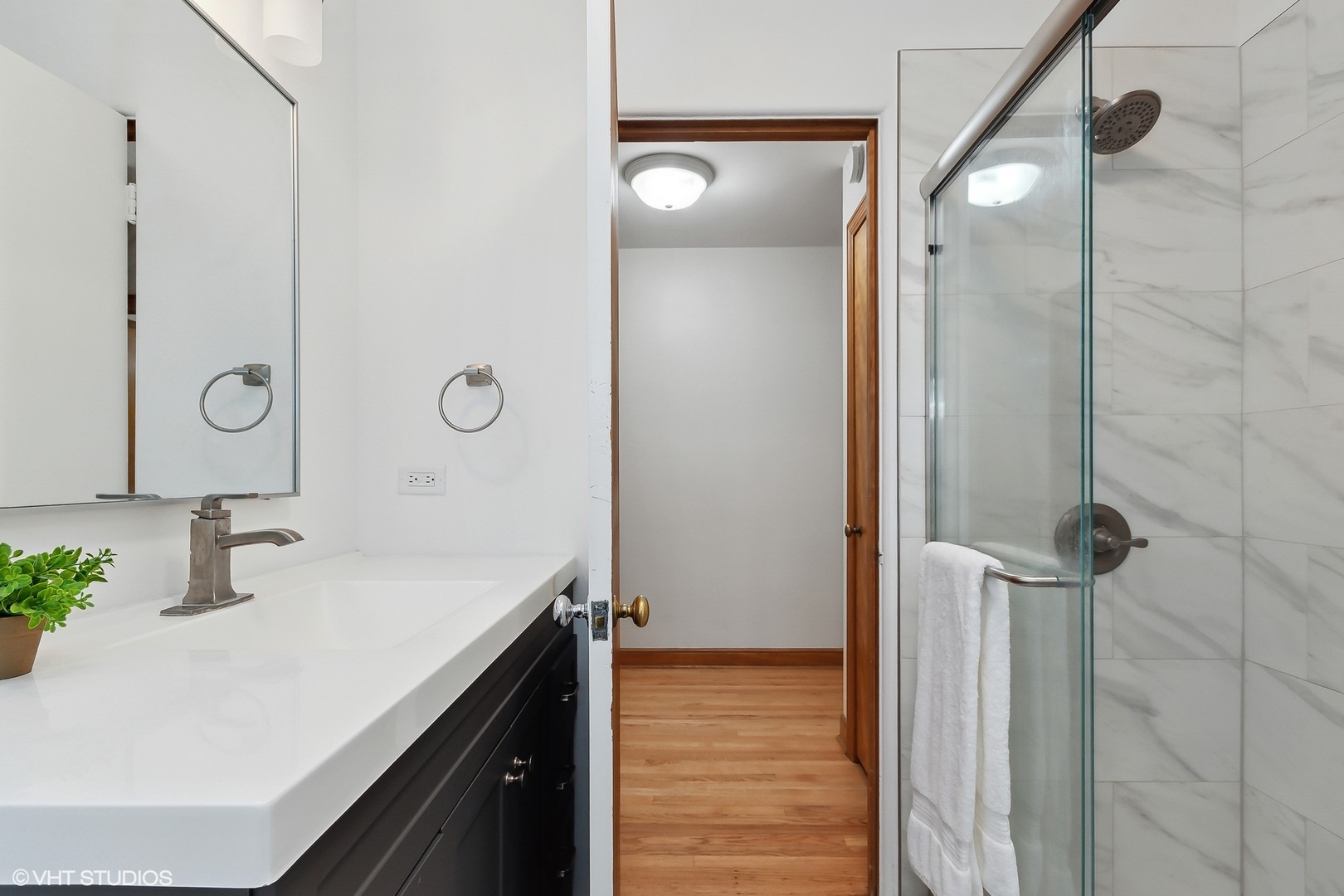402 Berry Road Barrington, IL 60010 - Photo 12 of 22 a bathroom with a sink and a mirror