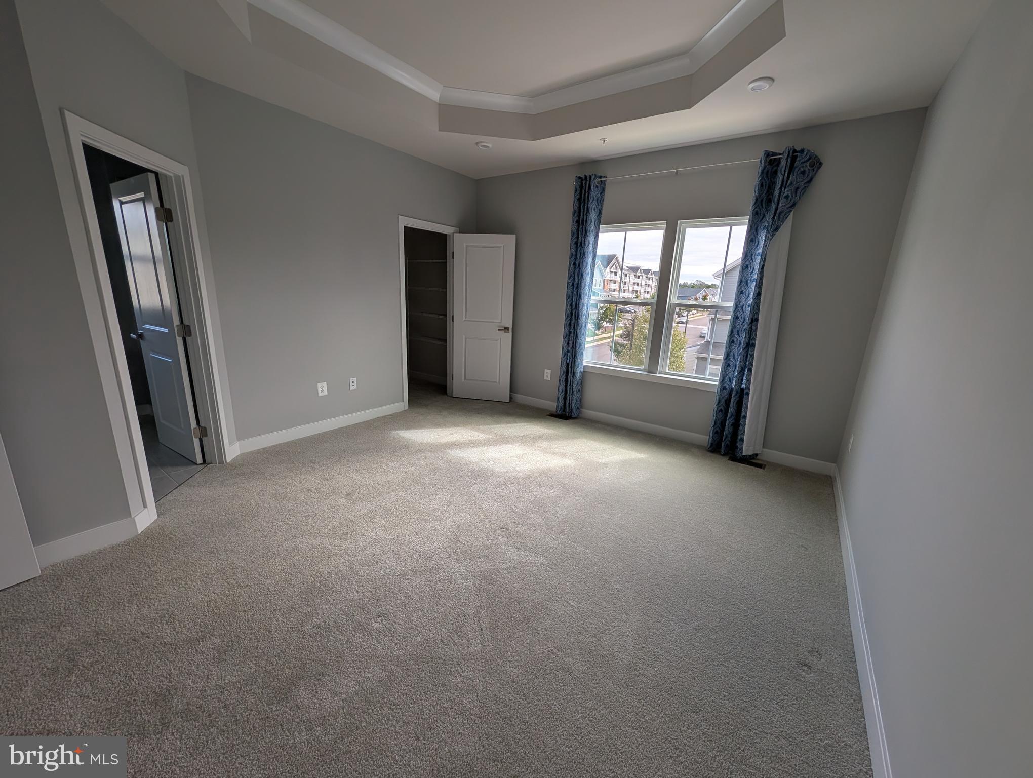 8445 Hamlin Street Lanham, MD 20706 - Photo 11 of 22 an empty room with windows