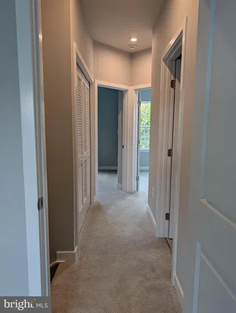 a bathroom with a double vanity sink and mirror