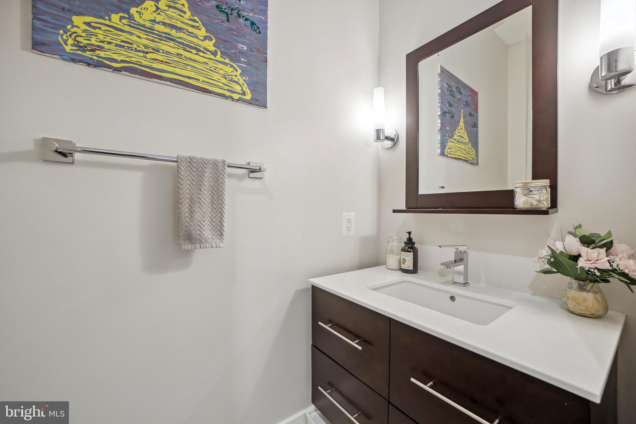 3815 14th Street Northwest, Unit 6 Washington, DC 20011 - Photo 11 of 15 a bathroom with a sink and a mirror