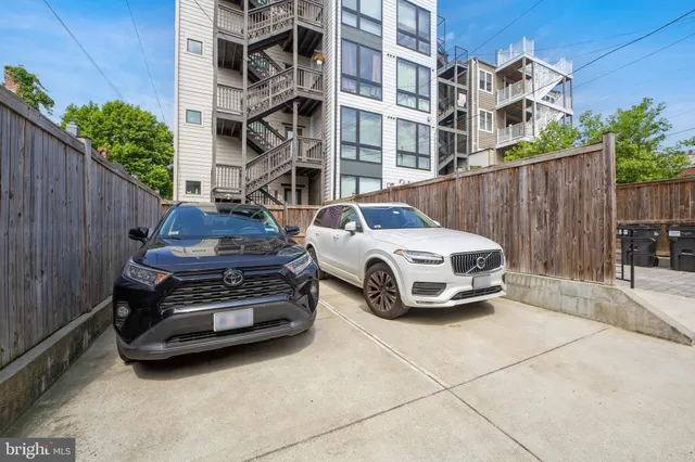 a car parked in front of a building