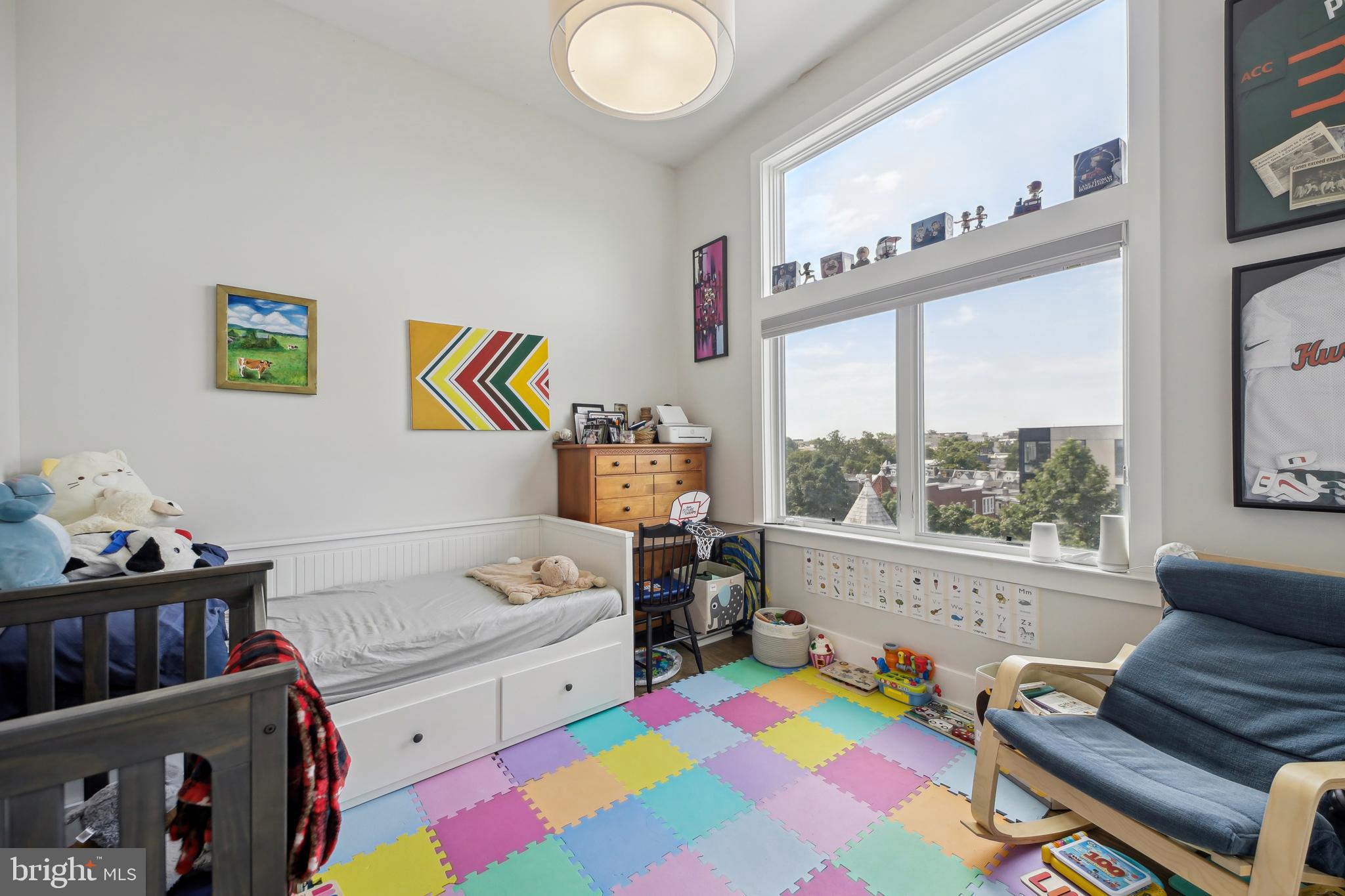 3815 14th Street Northwest, Unit 6 Washington, DC 20011 - Photo 9 of 15 a bedroom with furniture and a window