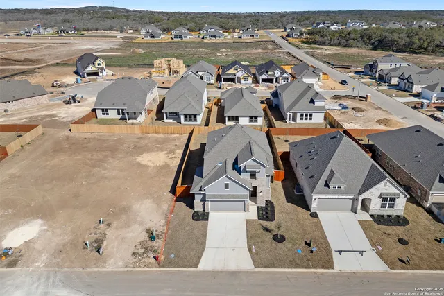a view of swimming pool with a lounge chair