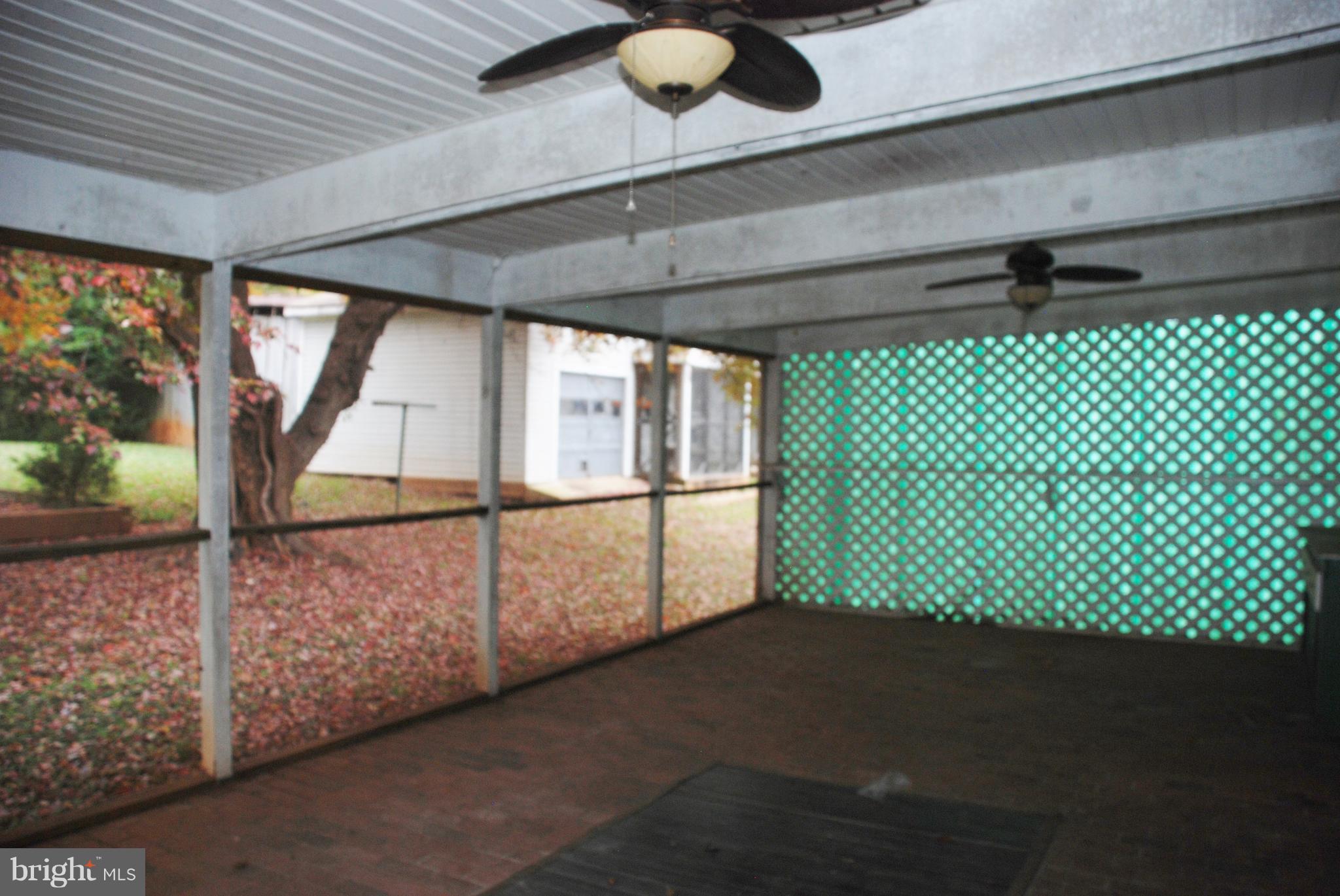 1002 North E St Extension Culpeper, VA 22701 - Photo 29 of 36 Rear screened porch