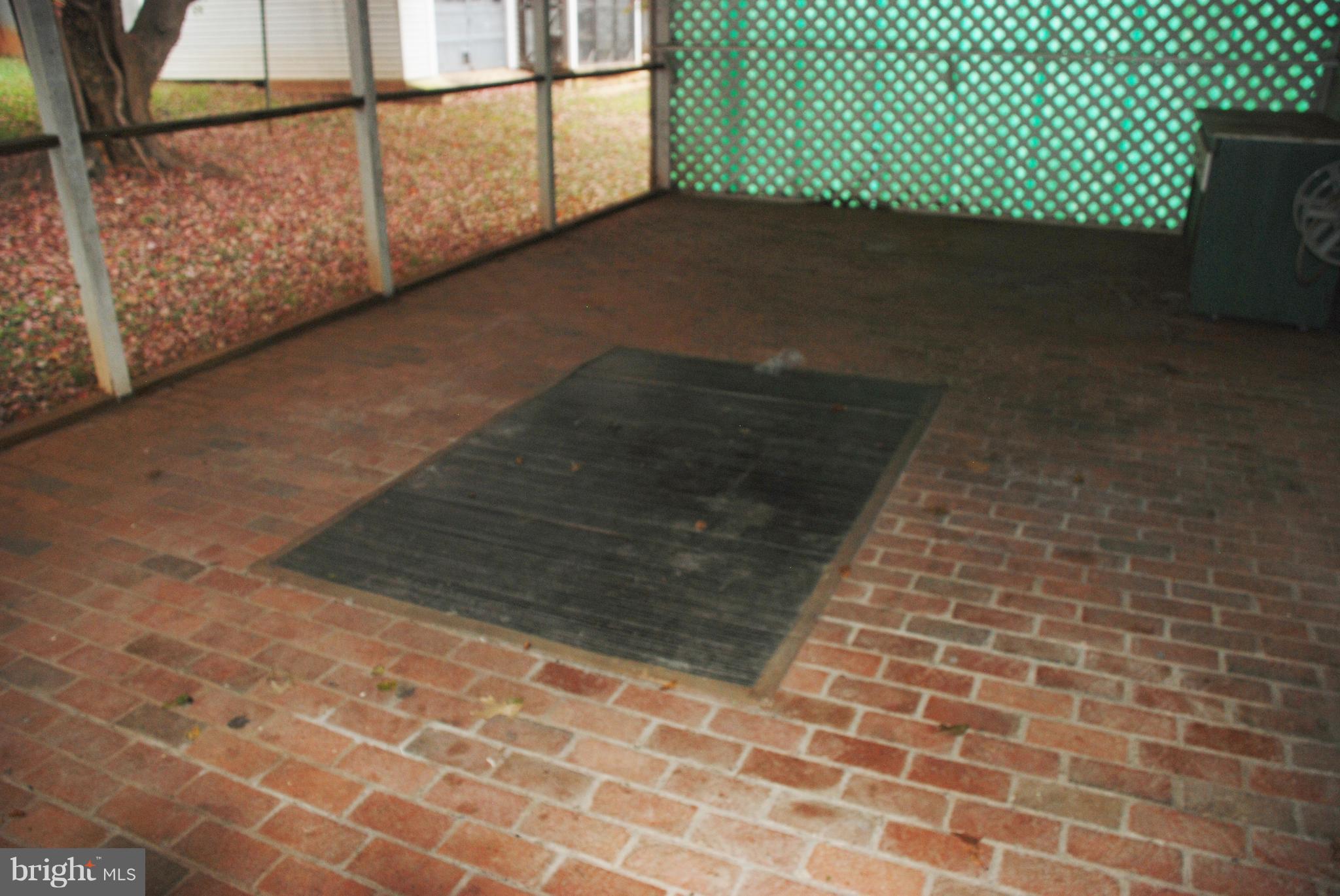 1002 North E St Extension Culpeper, VA 22701 - Photo 30 of 36 Screened Porch BRICK floor