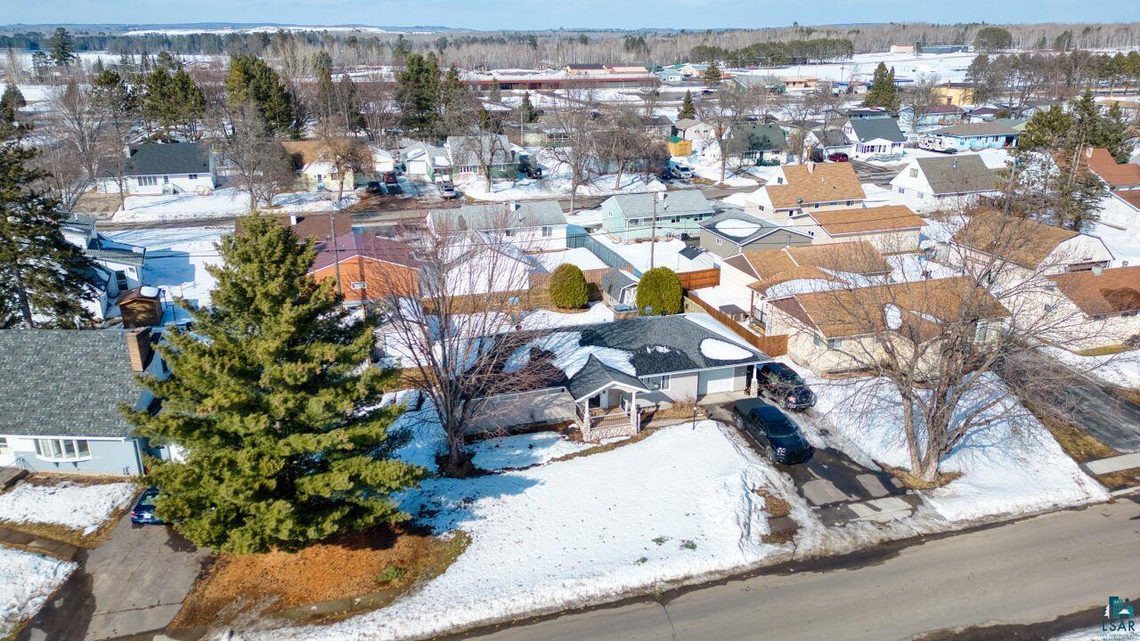 203 Wyandotte Road Hoyt Lakes, MN 55750 - Photo 38 of 44 Snowy aerial view featuring a residential view