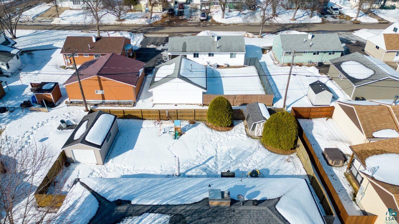 203 Wyandotte Road Hoyt Lakes, MN 55750 - Photo 42 of 44 Snowy aerial view with a residential view
