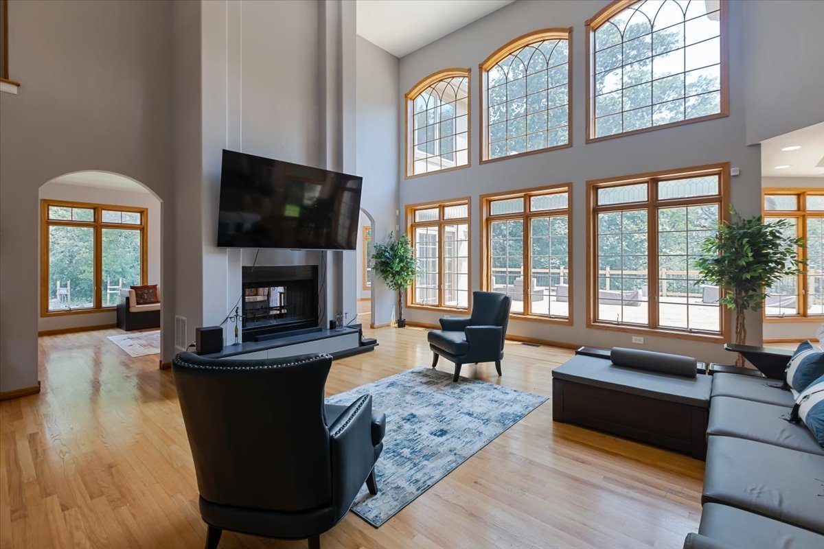 872 Rosedale Terrace Crete, IL 60417 - Photo 12 of 54 a living room with furniture fireplace and flat screen tv