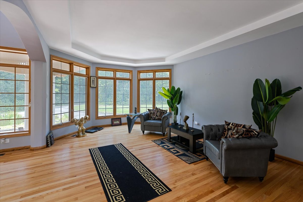 872 Rosedale Terrace Crete, IL 60417 - Photo 14 of 54 a living room with furniture and a large window