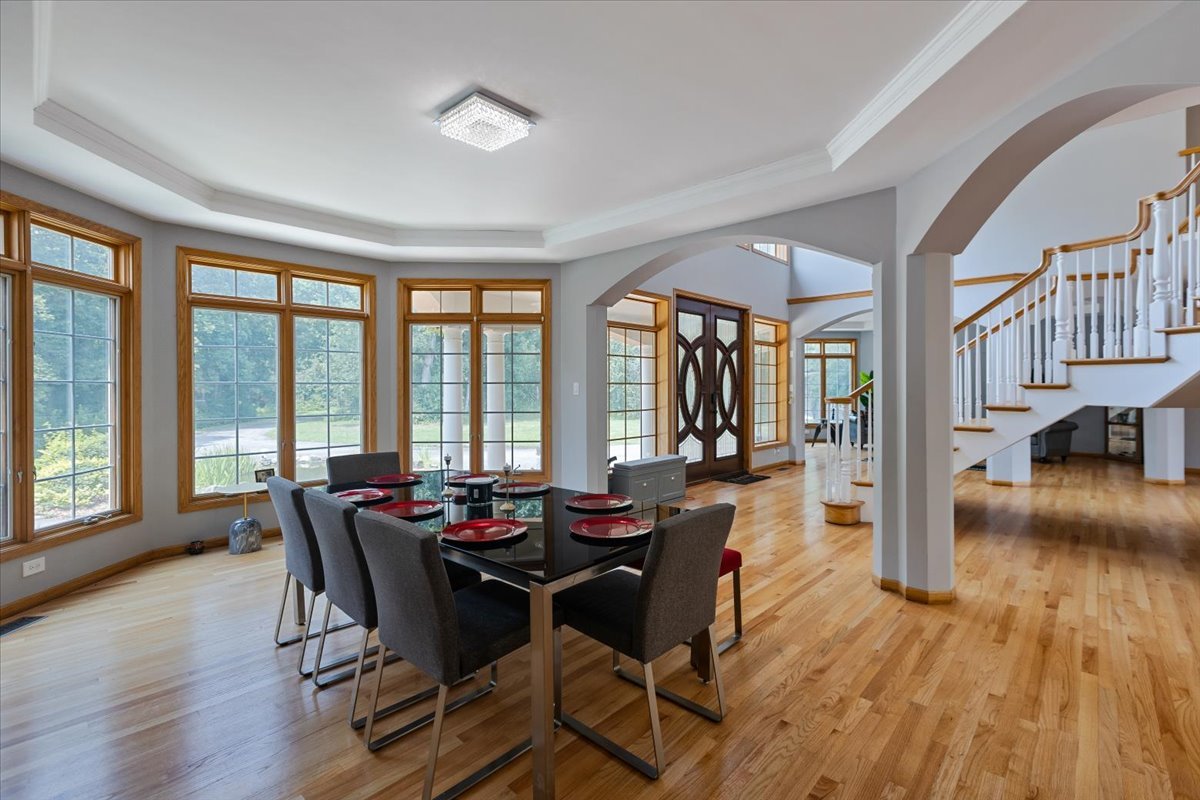 872 Rosedale Terrace Crete, IL 60417 - Photo 16 of 54 a view of a dining room with furniture and wooden floor