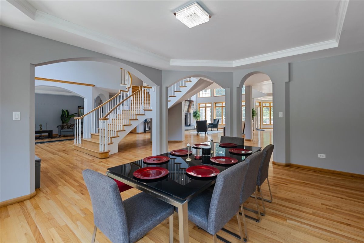 872 Rosedale Terrace Crete, IL 60417 - Photo 17 of 54 a view of a dining room with furniture window and wooden floor