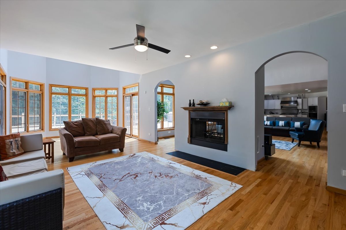 872 Rosedale Terrace Crete, IL 60417 - Photo 28 of 54 a living room with furniture and a fireplace
