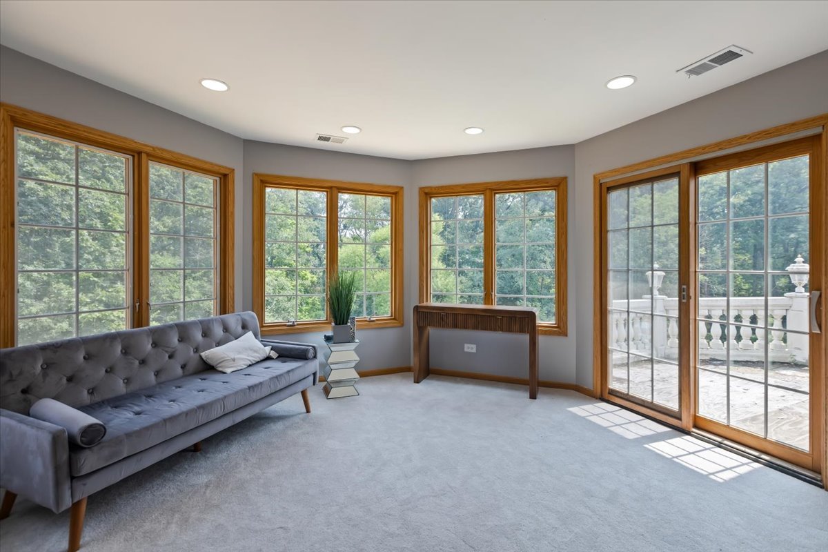 872 Rosedale Terrace Crete, IL 60417 - Photo 33 of 54 a living room with furniture and large windows