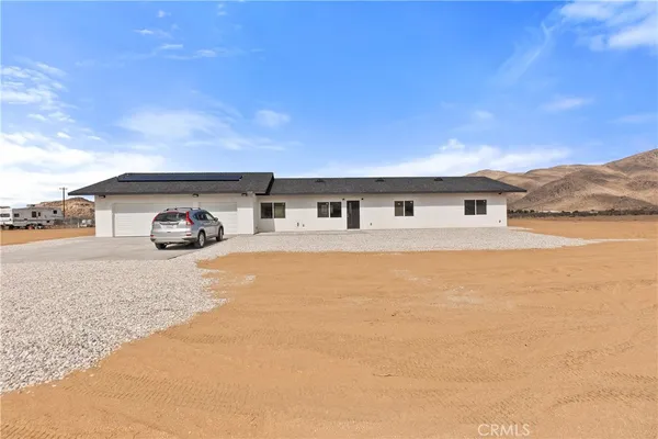 a car parked in front of a house