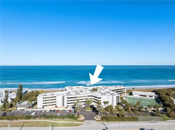 an aerial view of beach and ocean