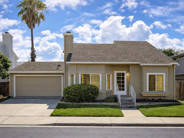 a living room with furniture or couch and a flat screen tv