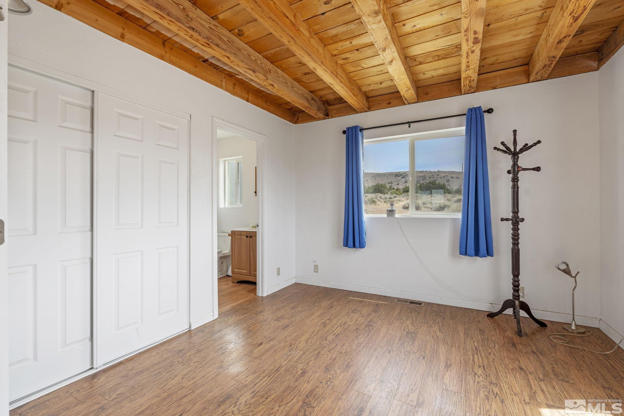 150 Red Corral Trail Reno, NV 89510 - Photo 17 of 40 a view of empty room with wooden floor