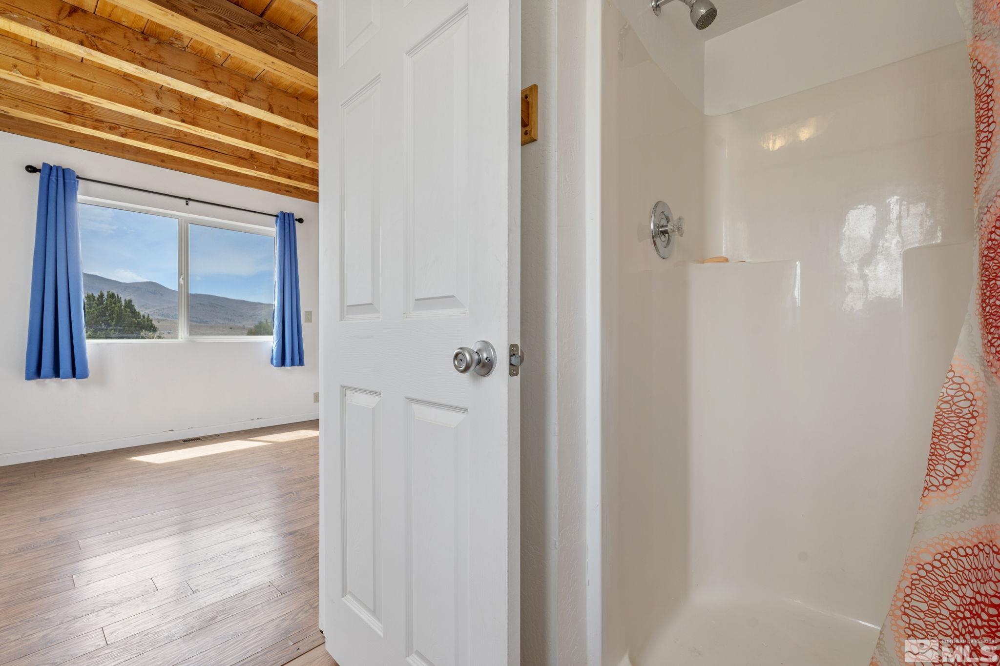 150 Red Corral Trail Reno, NV 89510 - Photo 20 of 40 a view of a hallway with wooden floor and closet