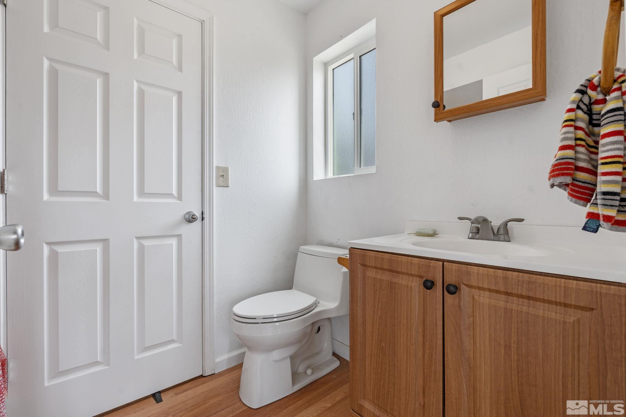 150 Red Corral Trail Reno, NV 89510 - Photo 21 of 40 a bathroom with a sink toilet and vanity