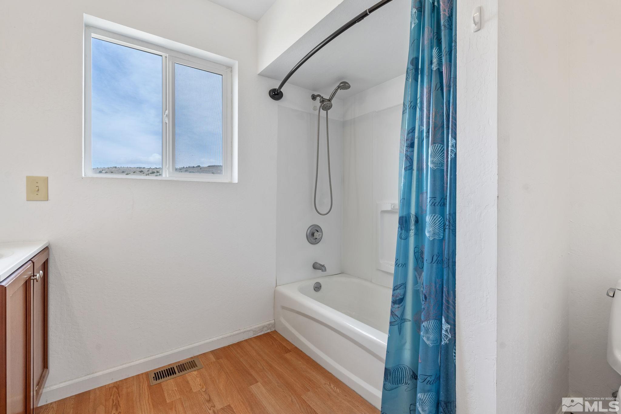 150 Red Corral Trail Reno, NV 89510 - Photo 23 of 40 a bathroom with a bathtub and a shower