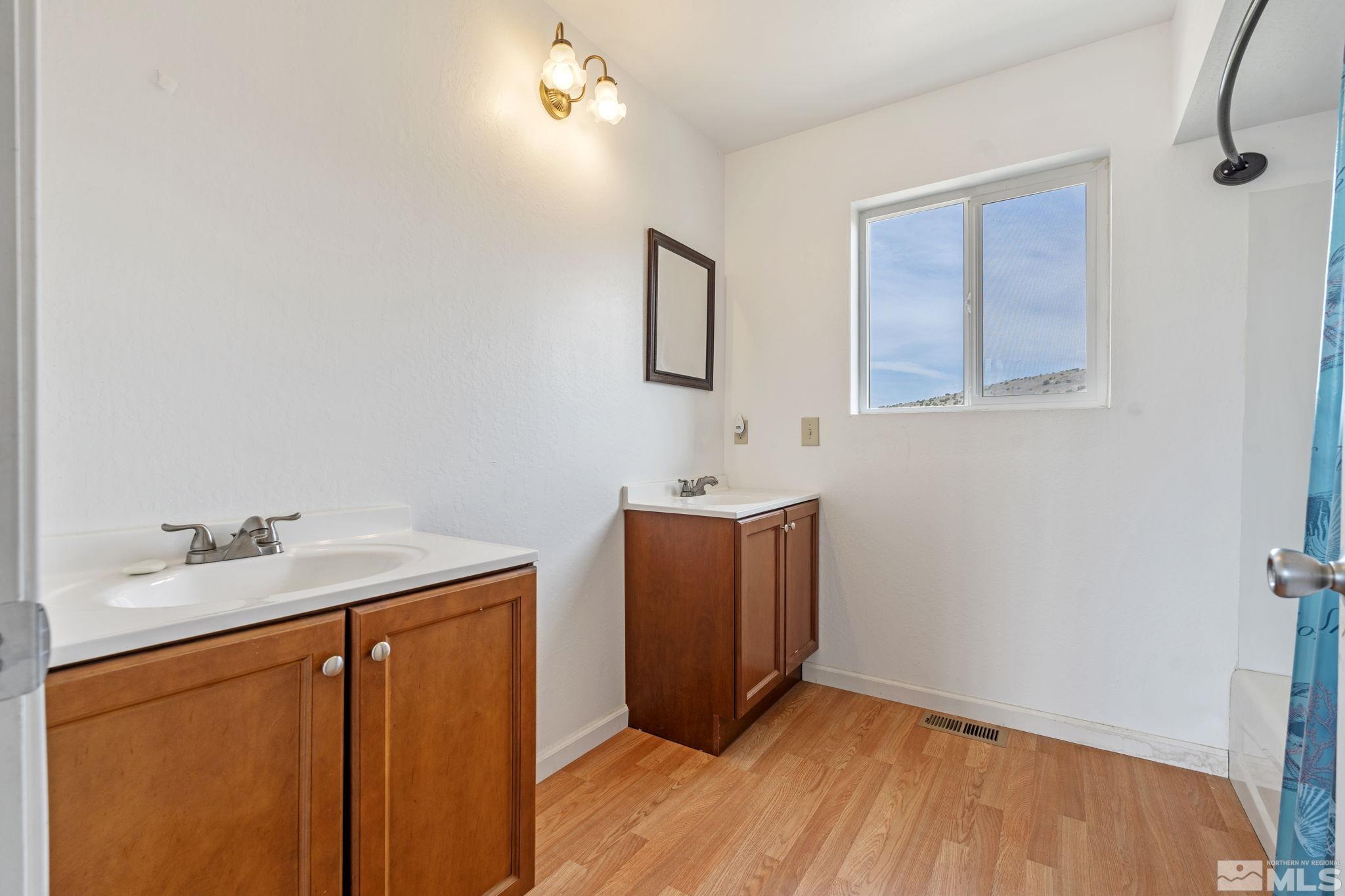 150 Red Corral Trail Reno, NV 89510 - Photo 24 of 40 a bathroom with a sink and a mirror