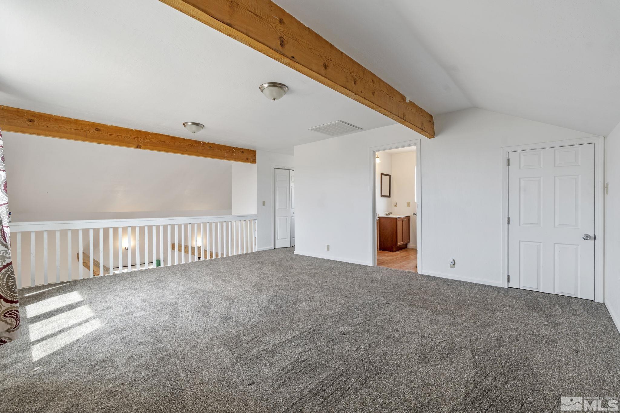 150 Red Corral Trail Reno, NV 89510 - Photo 25 of 40 a view of an empty room with wooden floor