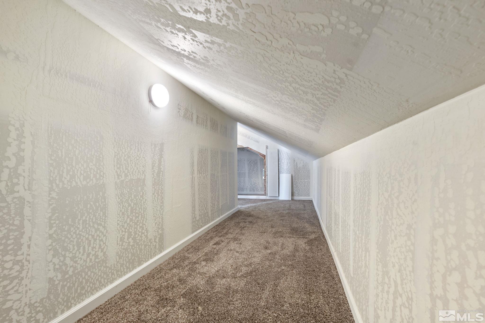 150 Red Corral Trail Reno, NV 89510 - Photo 27 of 40 a view of a big room with windows