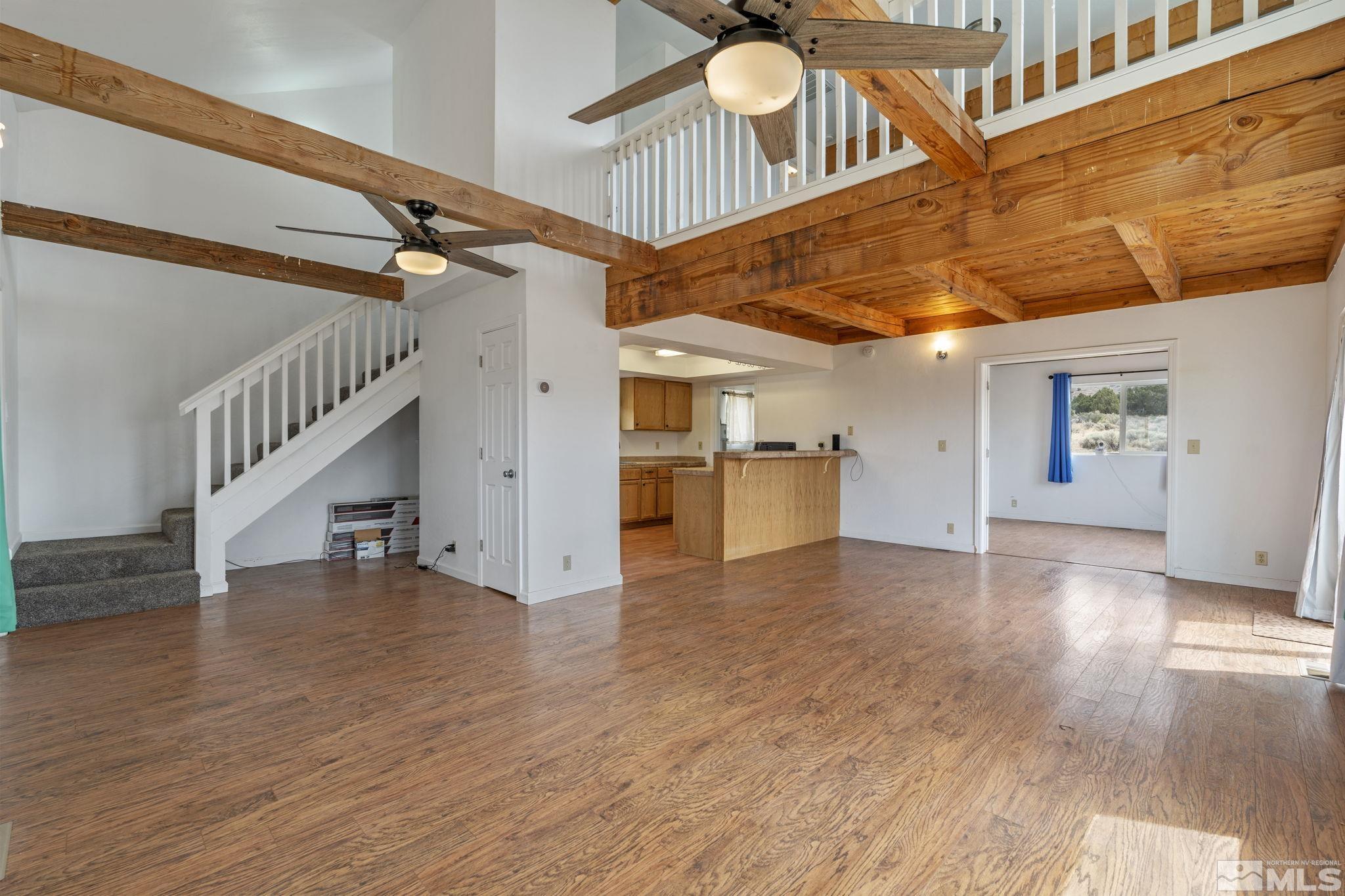 150 Red Corral Trail Reno, NV 89510 - Photo 4 of 40 a view of empty room with wooden floor