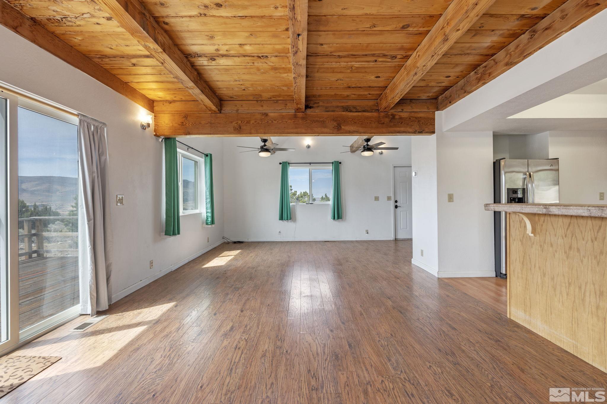 150 Red Corral Trail Reno, NV 89510 - Photo 6 of 40 a view of a hallway with wooden floor