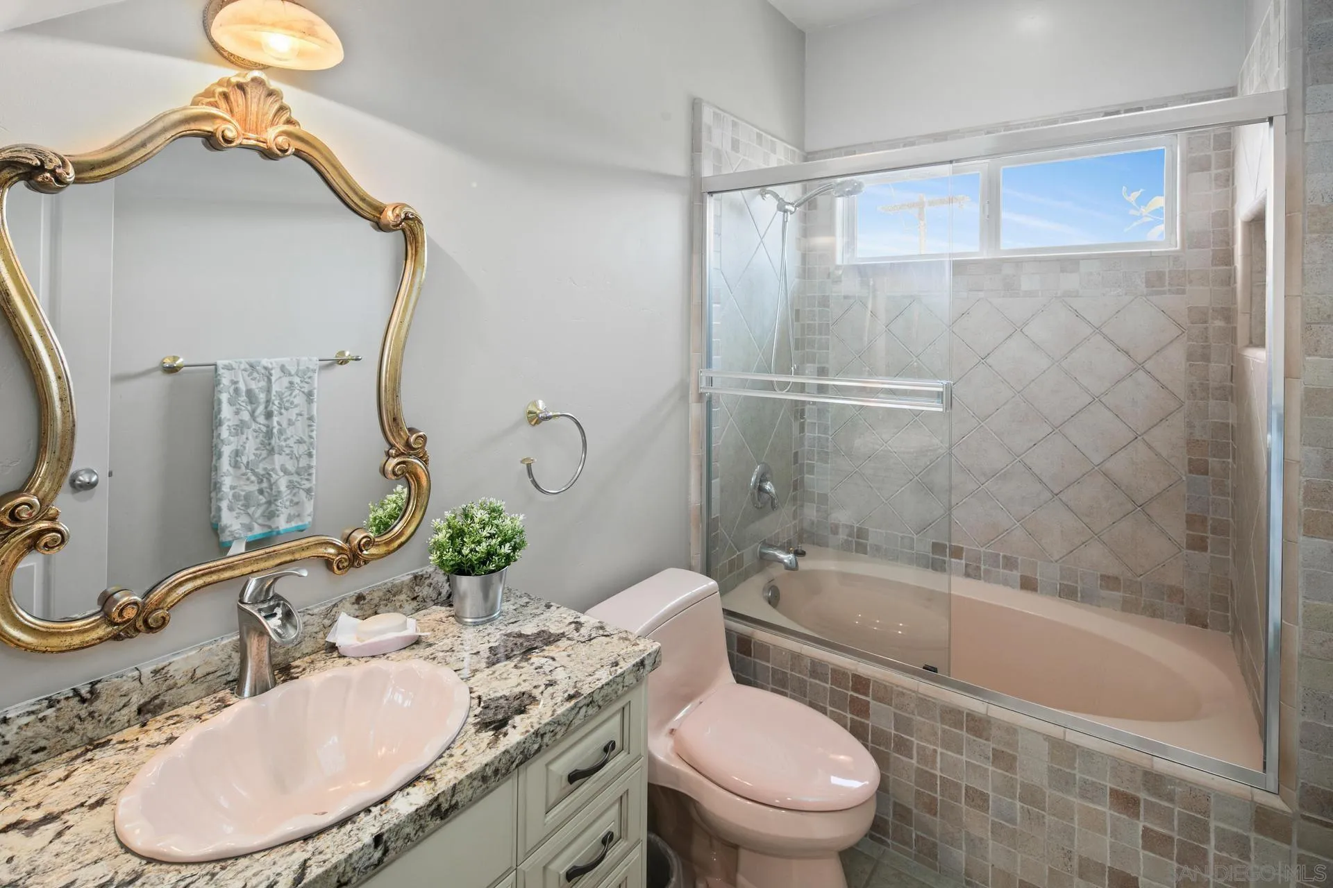 1100 Pine Street Coronado, CA 92118 - Photo 18 of 57 a bathroom with a granite countertop sink toilet and shower