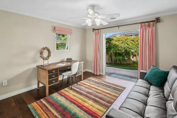 a view of entryway with wooden floor and door