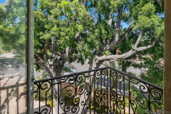 a kitchen with stainless steel appliances sink refrigerator and wooden floor