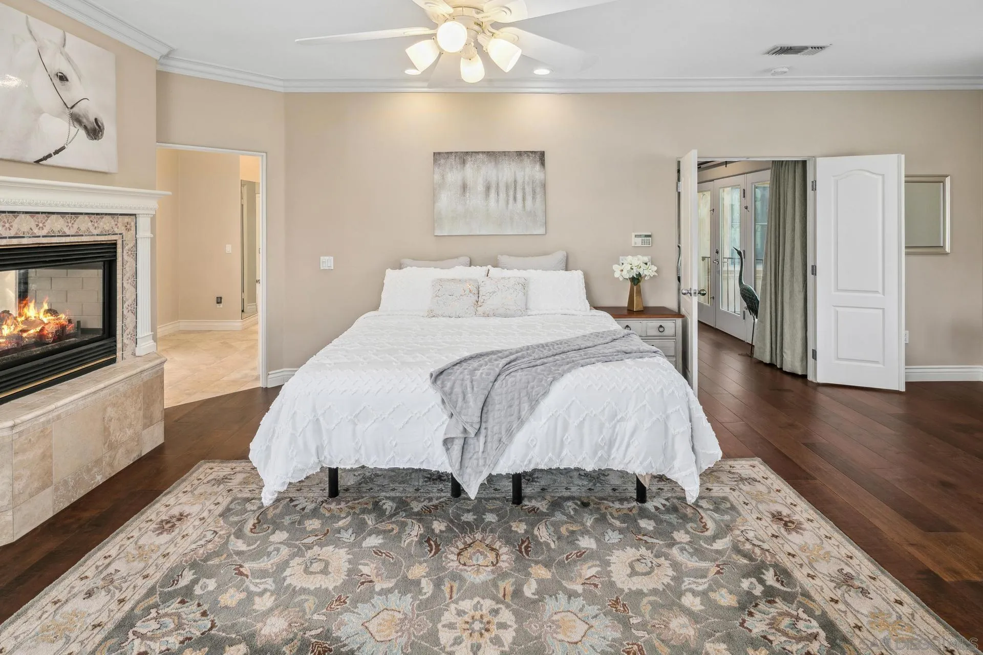 1100 Pine Street Coronado, CA 92118 - Photo 32 of 57 a bed room with a bed and a fireplace