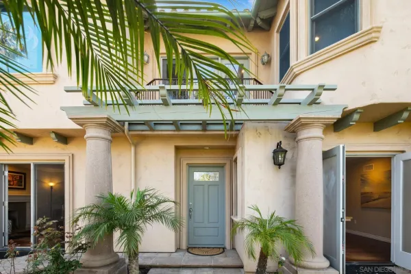 a view of a house with a street