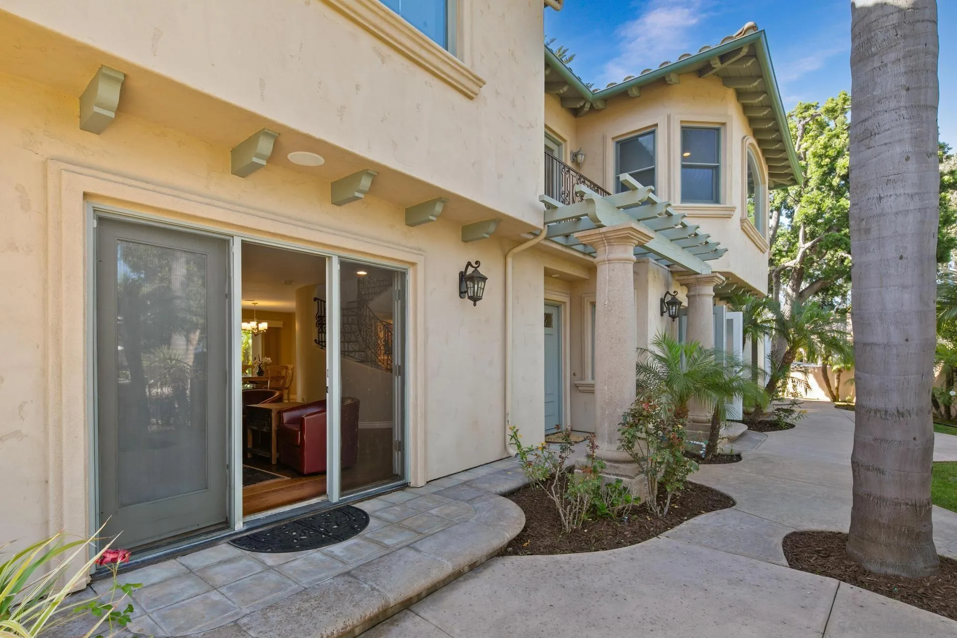 1100 Pine Street Coronado, CA 92118 - Photo 53 of 57 a front view of a house with a garden