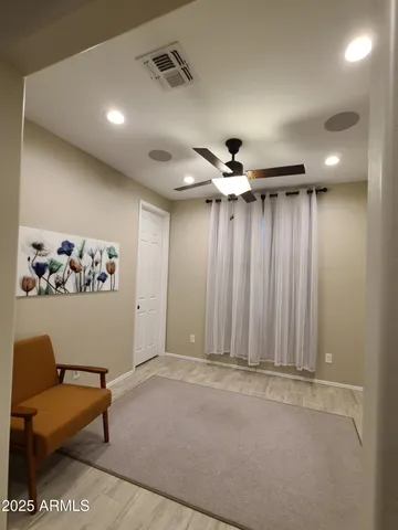 a view of a room with toys and furniture