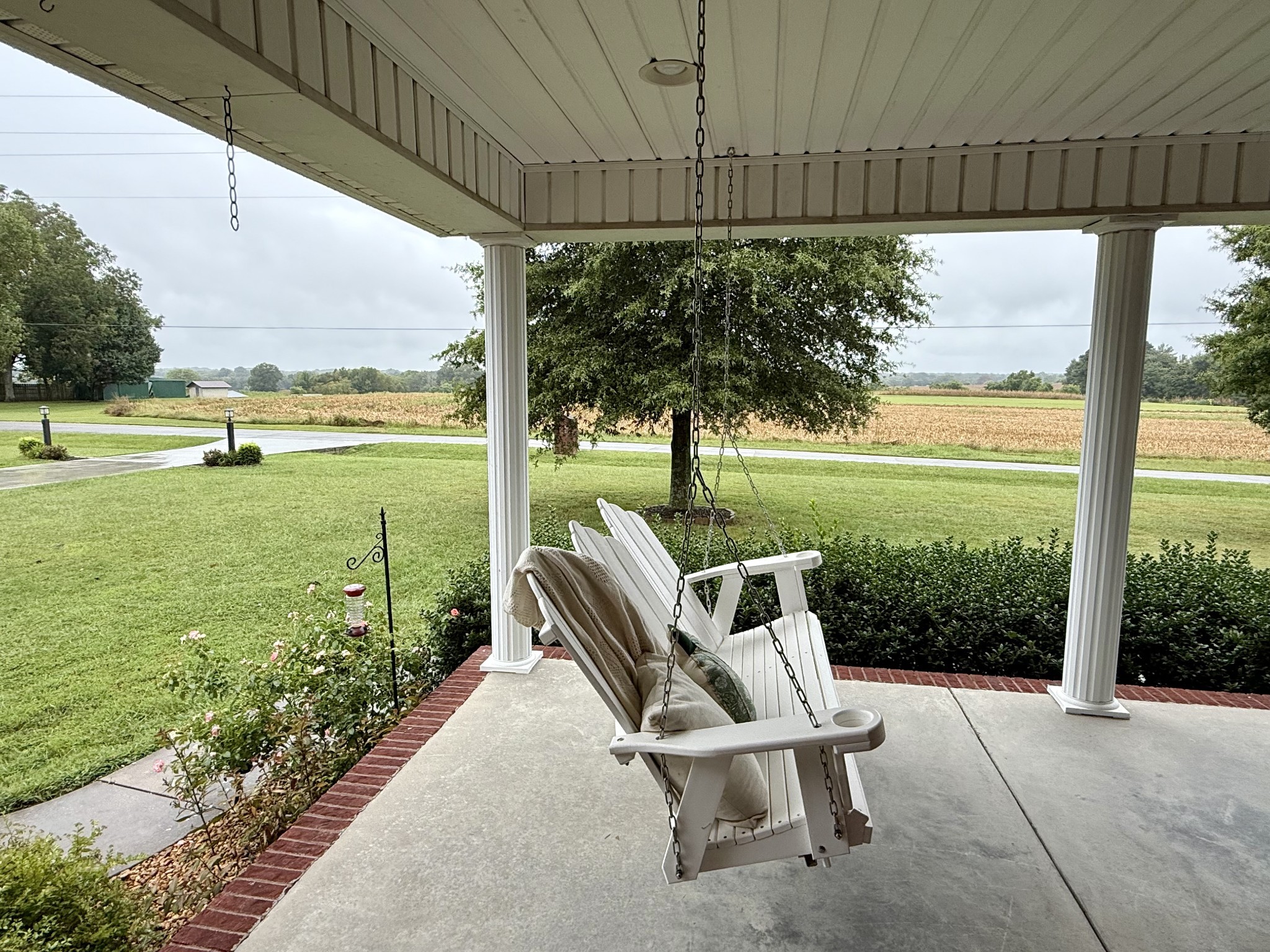 646 Indian Creek Road Huntland, TN 37345 - Photo 58 of 61 a view of a two chairs in the balcony next to a yard