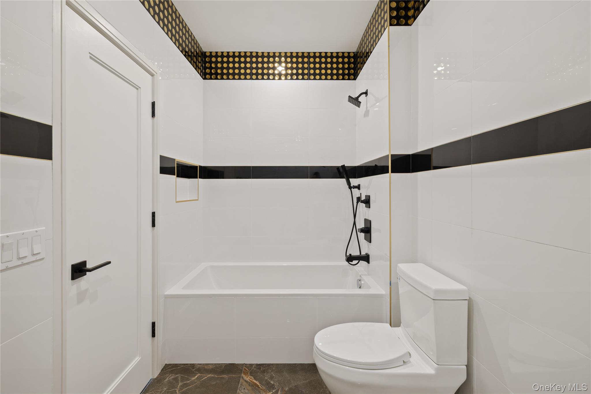 15 Ridge Avenue, Unit 204 Spring Valley, NY 10977 - Photo 20 of 41 a bathroom with a toilet and a shower