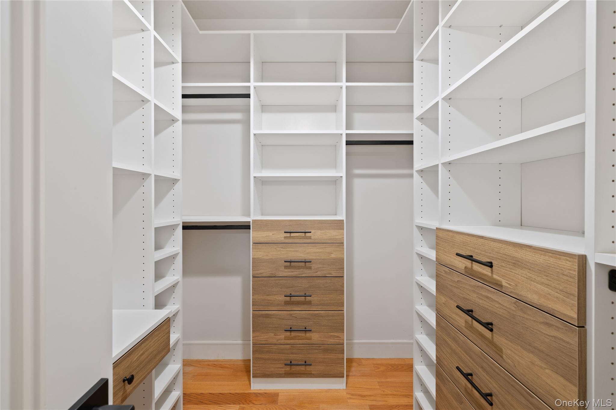 15 Ridge Avenue, Unit 204 Spring Valley, NY 10977 - Photo 21 of 41 a view of walk in closet with empty racks