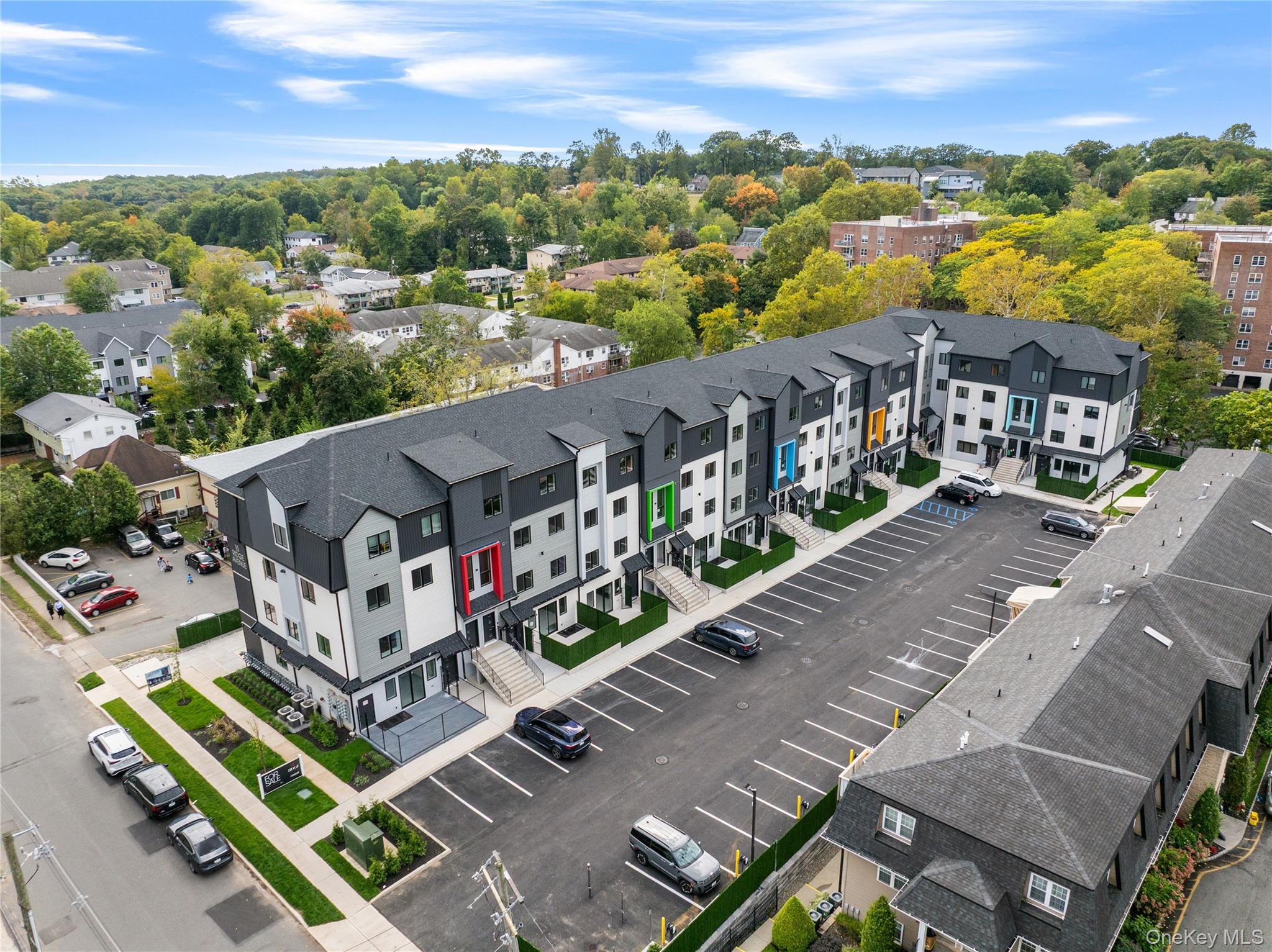 15 Ridge Avenue, Unit 204 Spring Valley, NY 10977 - Photo 41 of 41 an aerial view of houses with yard