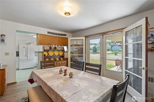 a kitchen with a sink stove and refrigerator