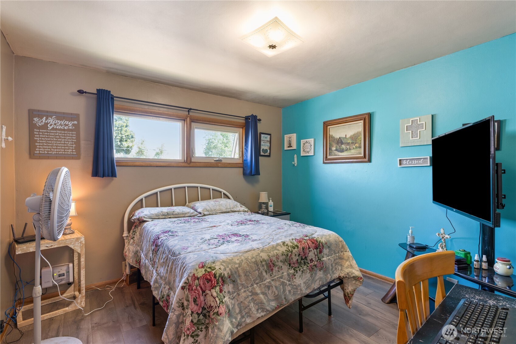 308 North 2nd Street Harrington, WA 99134 - Photo 16 of 37 a bedroom with a bed and wooden floor