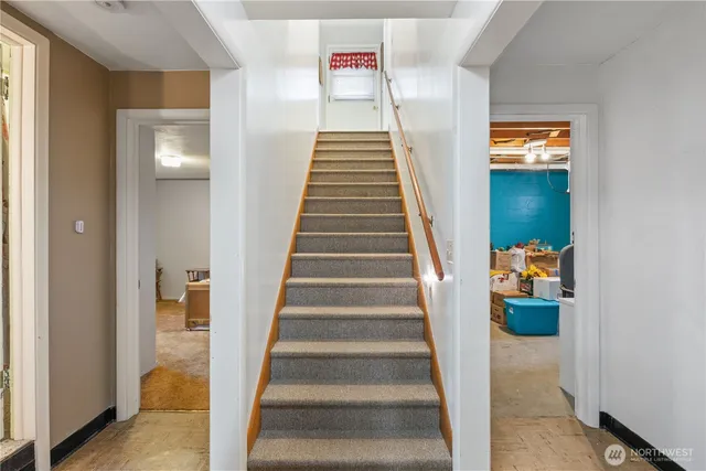 a living room with furniture and a table