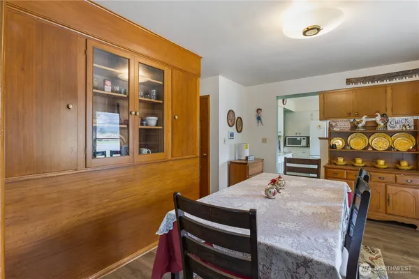 a view of a dining room with furniture window and outside view